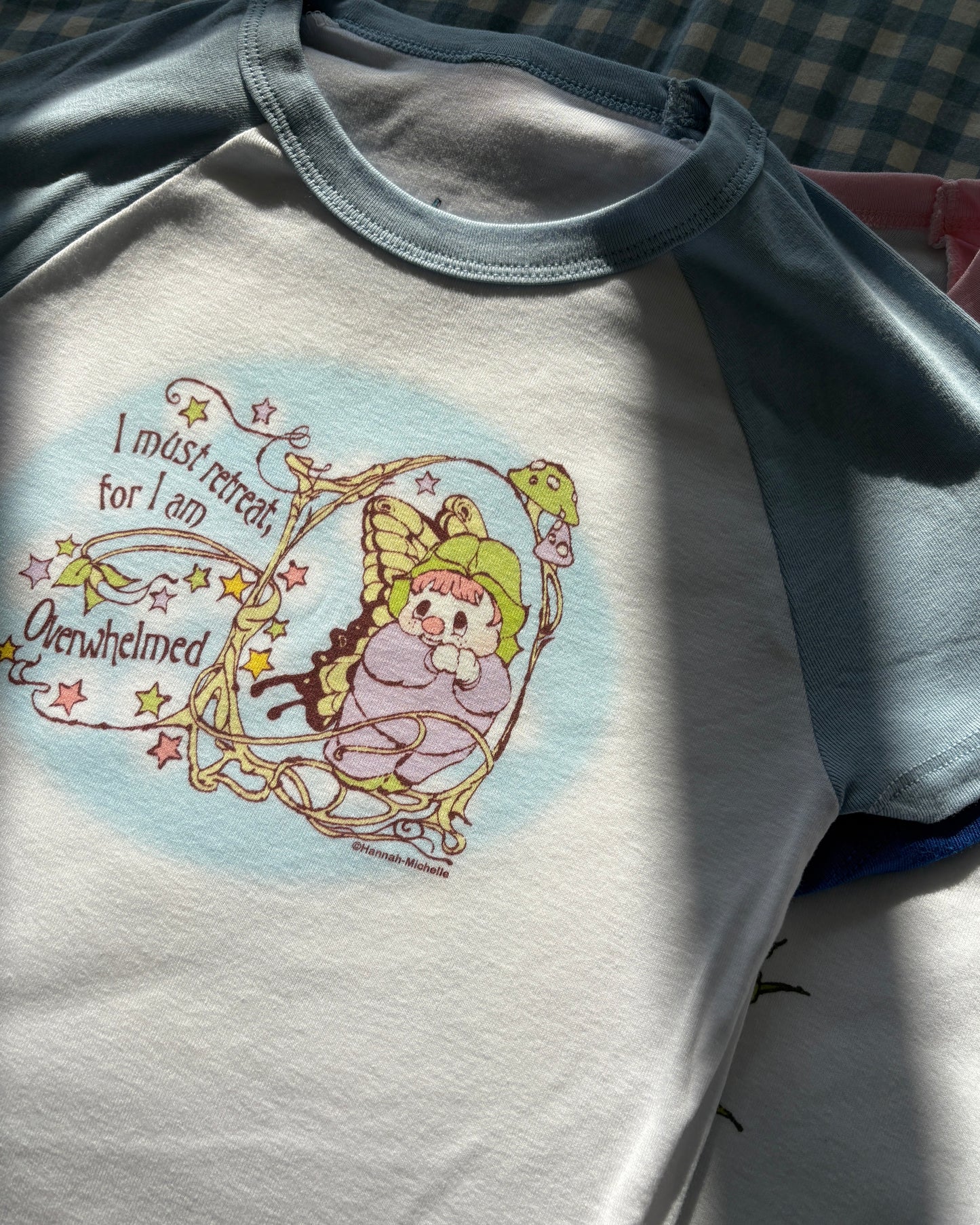 Overwhelmed micro rib raglan printed baby tee